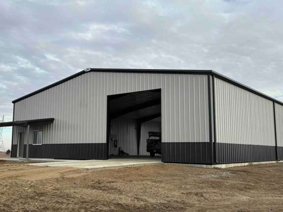 Steel frame AGI Sentinel Building for farm equipment repair and storage near Lake Andes South Dakota