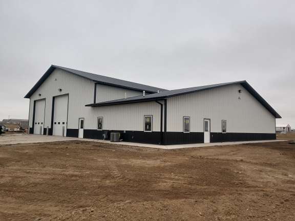 Post frame farm building with office