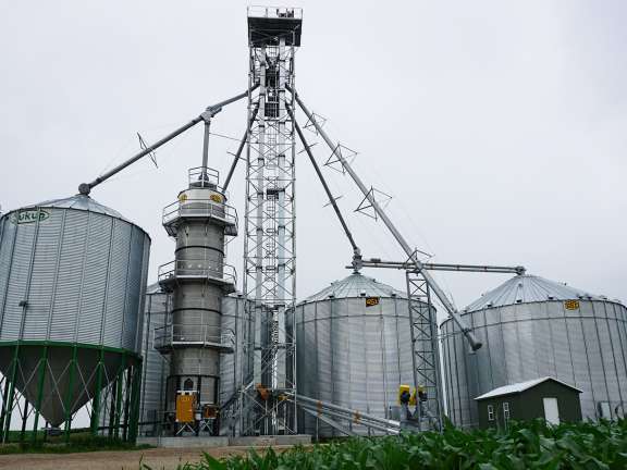 GSI grains system with 3 GSI bins, wet bin, and tower grain dryer near Hartford SD